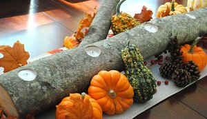 Then again, I'm not sure if it's a tree branch or a trunk. Still, you have to think the candle arrangement is clever.