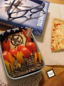 Comes with a Hunger Games sandwich and some veggie flames. Also, like the arrow stuck into it.