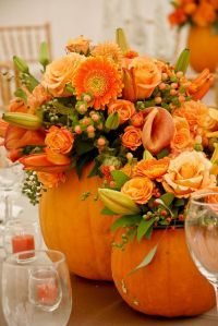 Of course, for the fall feel the flowers has to match with the pumpkin's exterior. Thus, I'm sure most of these flowers came from a craft store.