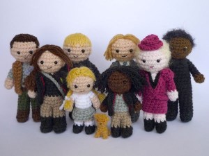 Now there's Katniss, Peeta, Gale, Haymitch, Effie, Prim, Cinna, Rue, and Buttercup. Of course, this ensemble is from the first book.