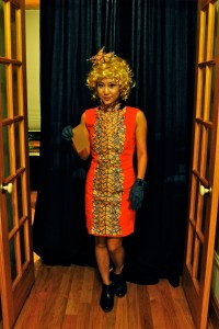 This is modest than what Effie wore in the movie. But it's still quite clever to say the least.