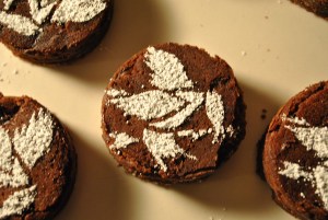 Other than the Mockingjay design, these look pretty doable. Just need to get some circular cookie covers, but they could be easy to make.