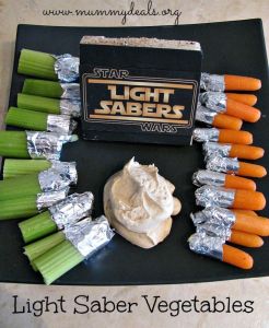 All you need is to cover one tip of celery and carrots with aluminum foil and you're all set. Talk about having sword fights on a veggie tray.