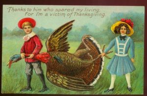 Okay, those kids are clearly carrying a dead turkey. Seriously, how do I explain such images to young children? 