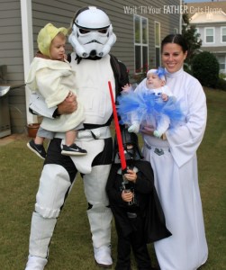 Let's see, the parents are a Stormtrooper and Princess Leia. The kids are Darth Vader, Yoda, and R2-D2. Still, the tutu is so cute.