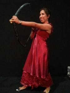 Of course, Katniss didn't shoot any arrows in a red dress. Well, as far as I know. But it's nice to imagine.