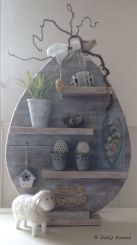 It's a shelf that's shaped like an egg. And it's all decked out for the spring for all your desires.