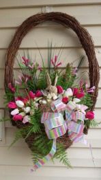 The bunny and the flowers aren't real. But they're sure lovely. Also, really like the bow.