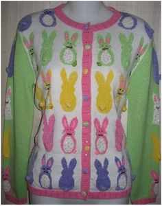 Each row of bunnies is of a different color. But not all are facing the same way. Also, not sure about the light green sleeves.