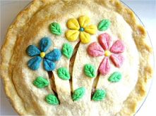 Yes, these are flowers on a pie. And I'm sure the pie filled with fruit and for dessert. Not sure what's in it though.