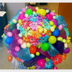 This one seems to have pom poms, eggs, and flowers of almost every color imaginable. Wonder how long it took to make that.