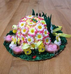 This one seems to have Easter flowers all over the hat. And even the chickies are wearing straw hats of their own.