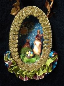 The rabbits are cut outs but the basket and eggs aren't. Still, this is very pretty.