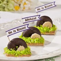 Religious or not, you have to admire the use of chocolate donuts in this one. Also, it doesn't seem hard to make either.