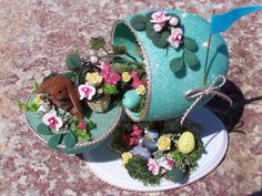 This one has all the flowers and a bunny coming out of it. Wonder who's the genius to think this up. This is pretty.