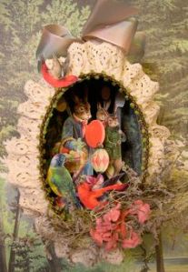 I know this egg has a some paper cut outs in it. But I like the nest with flowers in it. So pretty.