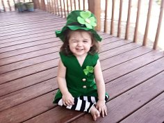 Sure the get up is made out felt. But this little lass seems to love how she looks. Doesn't she?