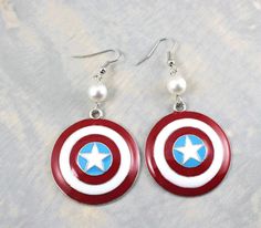 Because a great weapon should have an image to become a great fashion accessory. Still, I think I split an earlobe with earrings that big.