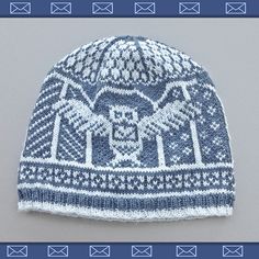 This is a beanie with an owl carrying a letter in it. Not sure if it's Hedwig though.