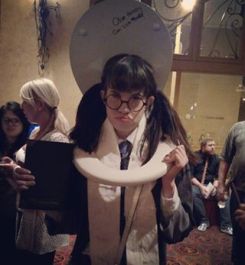 Because she's a ghost in a girl's bathroom. It's where she died after looking into the Basilisk from the Chamber of Secrets.