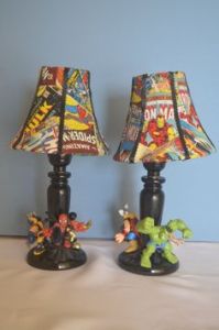 Lampshades have comics on them. Bases have action figures. Come in 2 varieties.