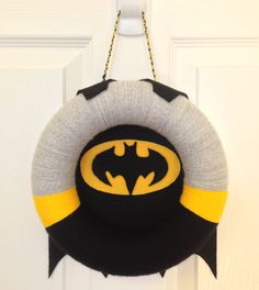 Because the black cape is where you put the bat symbol. A homey addition to any batcave.