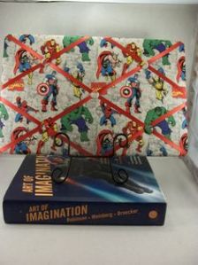 Seems like you can find Avengers fabric if you can find the right location. It's also lined with orange ribbons and white buttons.