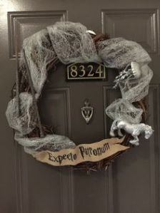 Yes, it's a Patronus wreath as you see. And it seems that these people's patronuses are a horse and jellyfish.