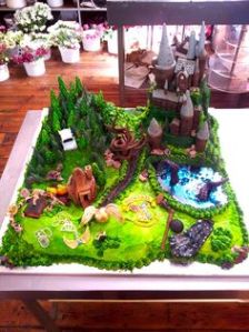 While some cakes features Hogwarts, this one has Hagrid's hut, the Forbidden Forest, the lake, and more. Love it.