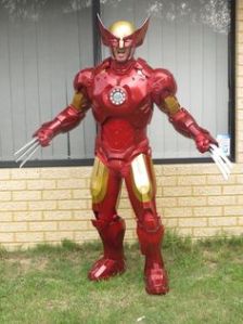 Yes, this is a combination of Wolverine and Iron Man. And yes, the claws go through the suit.