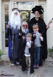 Guess the parents are Dumbledore and McGonagall. The boys are Harry and Ron. And the girl is Luna. Love the Dumbledore beard though.