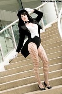 She's a superhero who also happens to be a magician. She's one of the most powerful sorceresses in the DC universe. And no, she didn't model for Playboy.