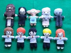 These are made of felt. Includes Harry, Ron, Hermione, Draco, Ginny, Hagrid, Snape, Dobby, Dumbledore, and Voldemort.