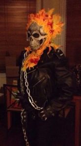 He's somewhat of a supernatural biker with flaming hair. Sure he's frightening to look at. But he seems so badass.
