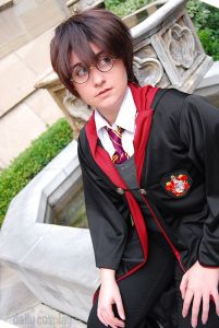 This is a woman dressed as Harry Potter. However, it's a very convincing costume that it goes on the post.