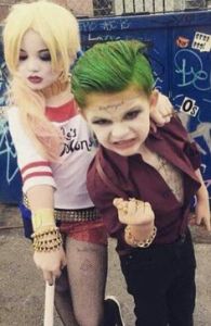 These two are dressed like the Joker and Harley Quinn from Suicide Squad. Nevertheless, since the upcoming film is certainly rated R, it's pretty disturbing.