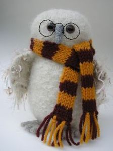 Yes, it's another stuffed Hedwig. But this one has Harry Potter glasses and a Gryffindor scarf.