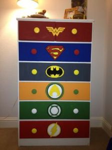 Each drawer has a superhero on it. This one consists of Wonder Woman, Superman, Batman, Aquaman, Green Lantern, and the Flash.