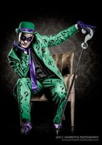 It's said the Riddler is a highly intelligent and smooth talking man with a host of personality disorders. He was also played by Jim Carrey in a movie.