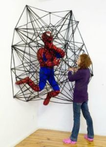 I think this is a crochet art display in an art museum. Still, want to know how Spider Man will get out of this one.