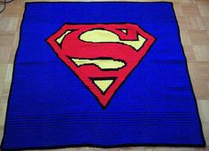 This one is blue with the Superman symbol on it. It's said to mean peace according to the Kryptonians, though after enduring a shitload of collateral damage.