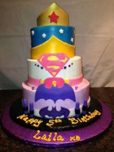 This a girl cake that includes Wonder Woman, Superman, and Batman. And yes, it's adorable.