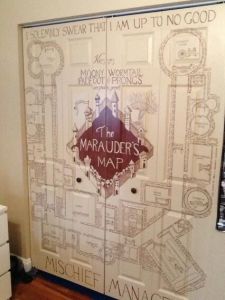 The Marauder's Map also tells you where people are at all times. Yet, I suppose this door was painted like the map by someone with too much time on their hands.