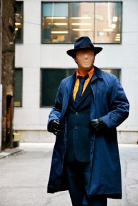 Question is his name. And yes, he tends to have his face covered so you won't know who he is. Rorschach from Watchmen is a homage to him.