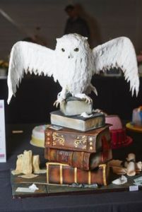Let's hope Hedwig didn't leave a little present for Harry on that stack of books. Then again, Hedwig's bowel movements don't seemed to be discussed much in the series.