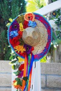 This one is covered in flowers and is used as an outdoor decoration. Love the ribbons, too. So pretty.