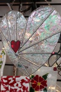 Maybe not but it sure looks like it. Nevertheless, you have to love this heart suncatcher design.