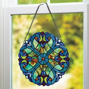 You got to love the stained glass on this. Seems like it comes straight from a Tiffany lamp. Very beautiful.