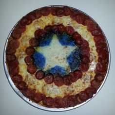 This one has pepperoni for the stripes. And blue food coloring for the center around the star.