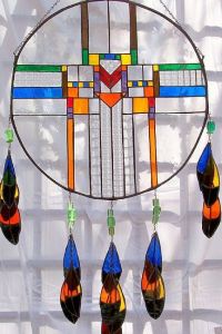 And this seems like a rainbow one at that. Or so it seems. At any rate, like the feathers.